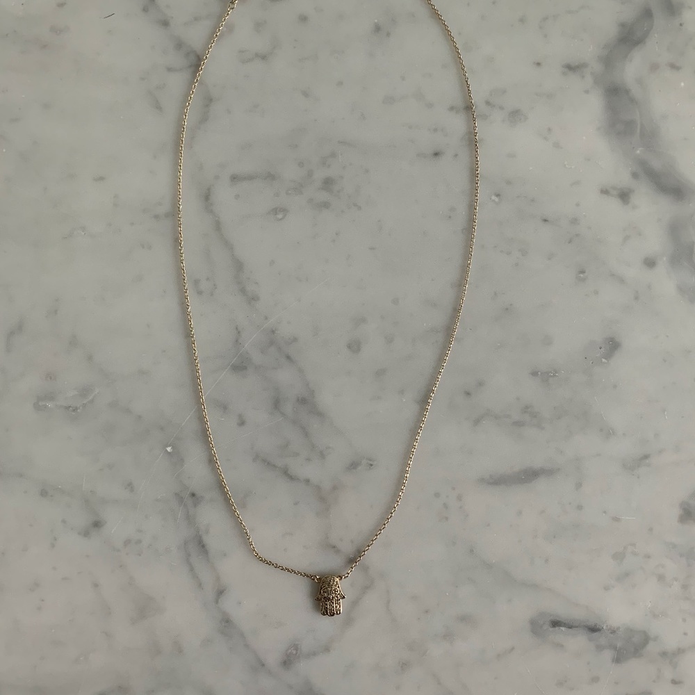 Gold plated hand necklace